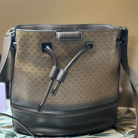Calvin Klein Handbags - Calvin Klein Tan and Brown Bucket Bag